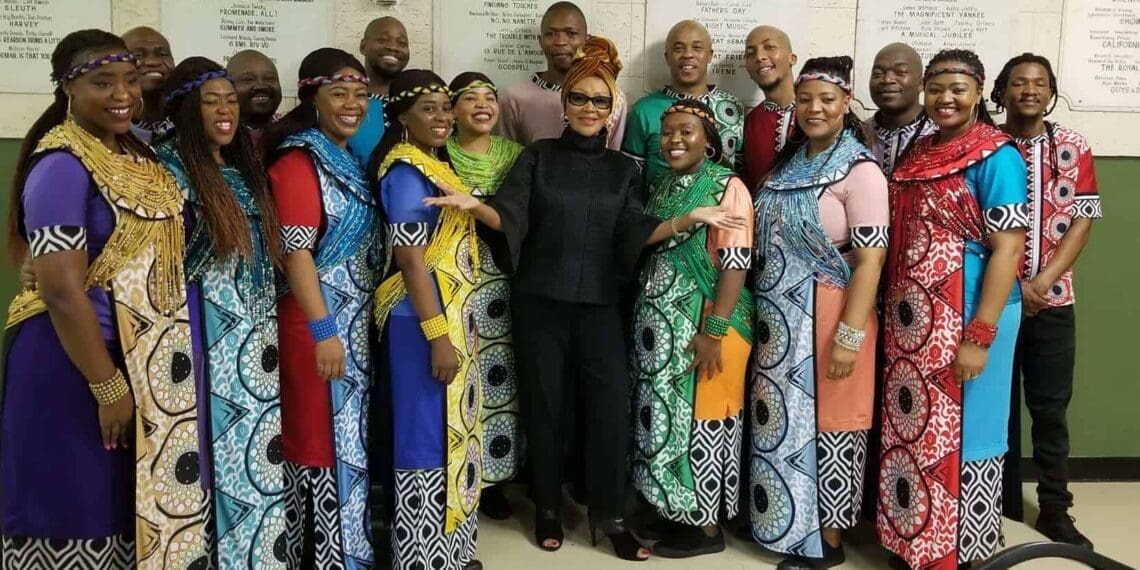 Legendary South African talk show host Felicia Mabuza-Suttle and members of the Soweto Gospel Choir.