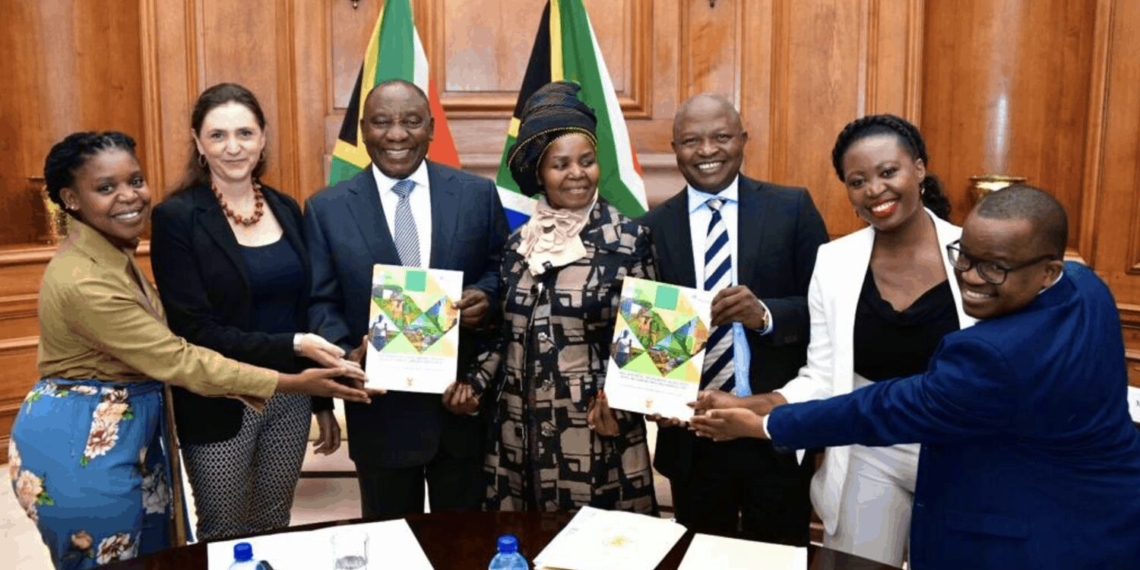 Pres. Cyril Ramaphosa pictured earlier with some of the members of his advisory panel on land reform.