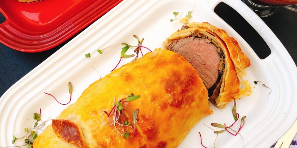 Beef wellington with a red wine jus