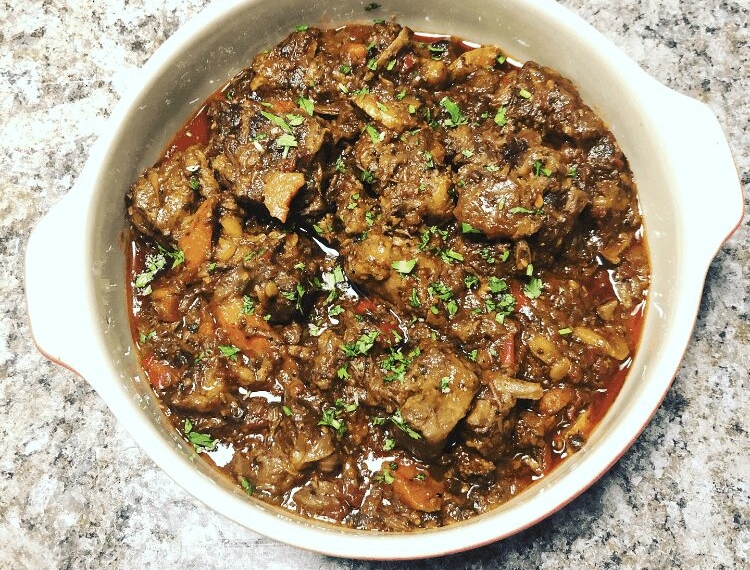 Boozy braised oxtail with a garlic mash is one of chef Patience Nyongane