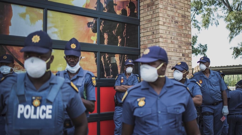 Members of the police wearing masks amid concerns over the spread of Covid-19. Photo: Marco Longari/AFP