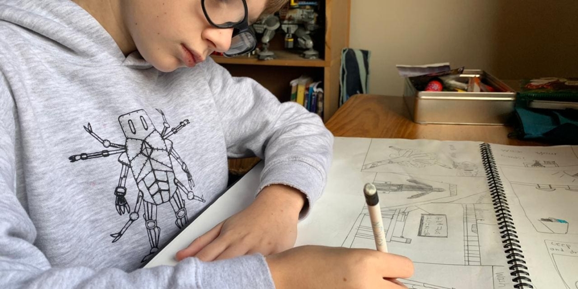 Baggo Stonetrip entrepreneur and cartoonist Jan Louwrens (11) has teamed up with Food For Mzansi for a covid-19 cartoon series. One of his robot sketches is now also featured on a new hand sanitiser range. Photo: Supplied
