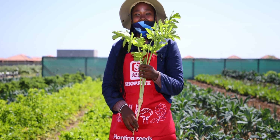 Garden project members like Aphelele Mhlakaza are turning the once depressing-looking grounds of Lentegeur psychiatric hospital in Cape Town into a therapeutic food garden. Photo: Supplied
