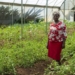 Founder Refiloe Molefe inside a greenhouse flourishing with healthy, organically grown food at the Bertrams Inner City Farm.
