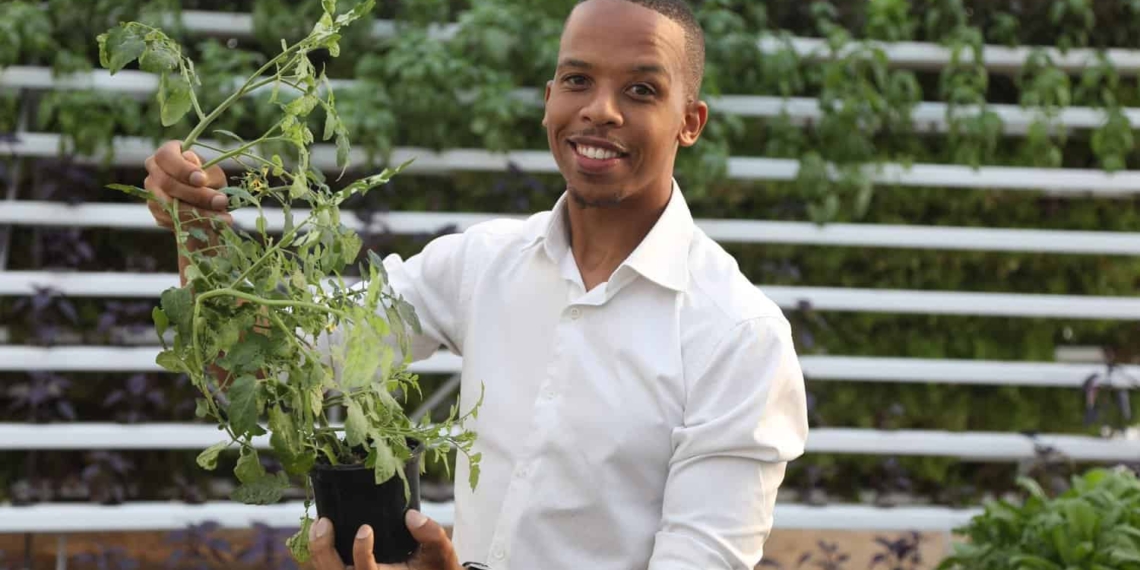 Khaya Maloney, vertical rooftop farmer in Johannesburg. Photo: Supplied