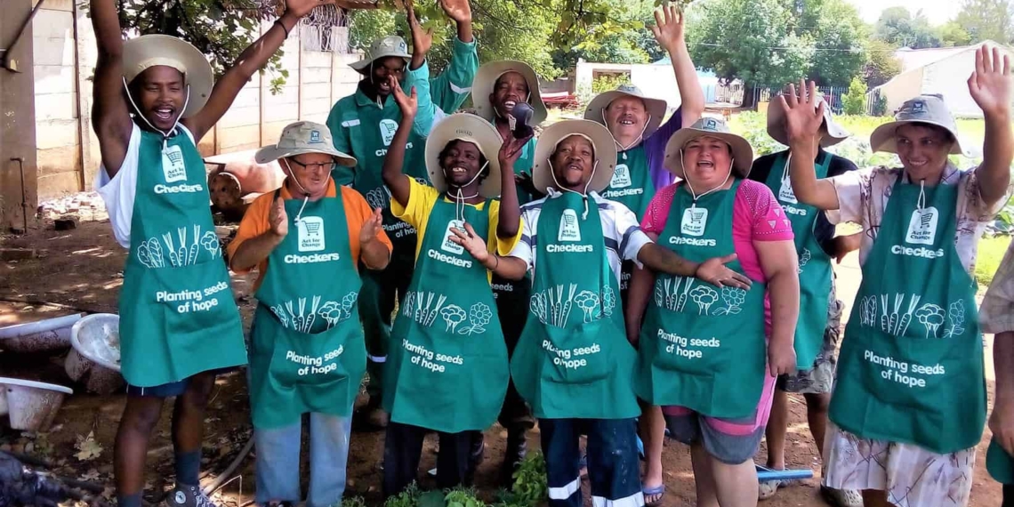 Residents at Epilepsy South Africa’s Free State and North West branch showing off their organic food garden. Photo: Supplied/Food For Mzansi