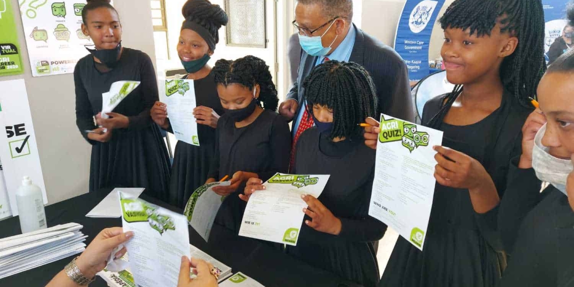 Western Cape agriculture minister Dr Ivan Meyer interacting with learners at Food For Mzansi's stand at the provincial government's career expo. Photo: Supplied/Food For Mzansi