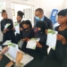 Western Cape agriculture minister Dr Ivan Meyer interacting with learners at Food For Mzansi's stand at the provincial government's career expo. Photo: Supplied/Food For Mzansi