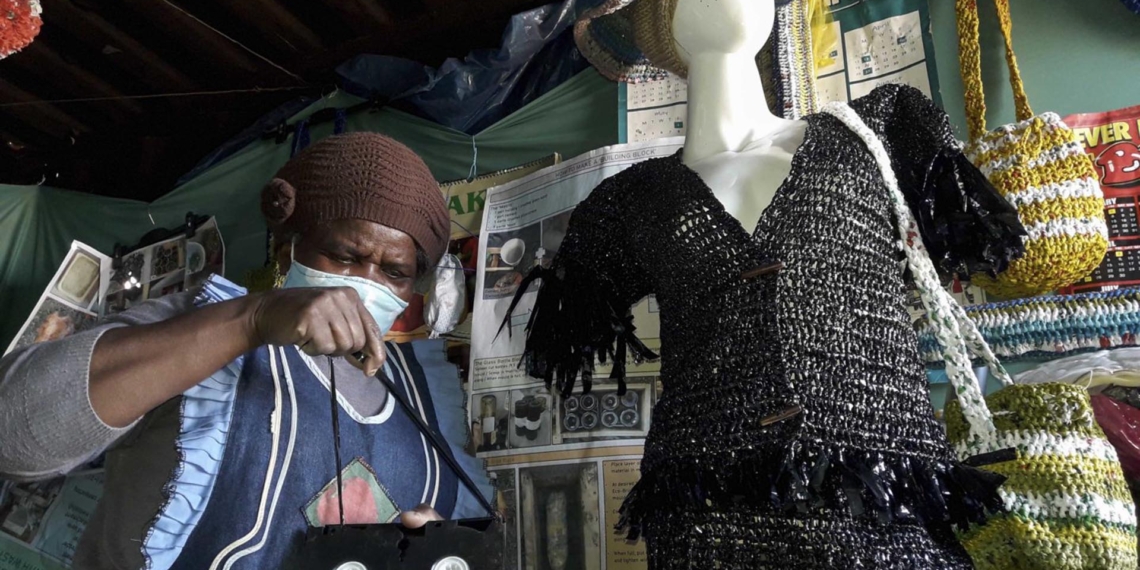 Recycling: Thenjiwe Jacobs, founder of the Noziqamo recycling project in Motherwell, Gqeberha, with an outfit she made using old VCR tapes. Photo: Photographs by Sibongile Portia Jonas