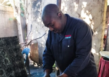 Given Ngwamba turned from looking for a job to creating jobs when he started making his own charcoal. Photo: Supplied/Food for Mzansi