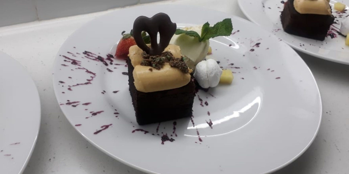 Make this Sunday a decadent one with Boitumelo Nyembe's malva pudding, topped with a creamy caramel. Photo: Supplied/Food For Mzansi