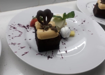 Make this Sunday a decadent one with Boitumelo Nyembe's malva pudding, topped with a creamy caramel. Photo: Supplied/Food For Mzansi