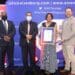 Dr Mogale Sebopetsa (Western Cape agriculture head of department), Dr Ivan Meyer (Western Cape minister of agriculture), Audrey September (the province's top agri worker of 2021) and Pieter van Zyl (general manager of procurement at Shoprite Freshmark). Photo: Supplied/Food For Mzansi