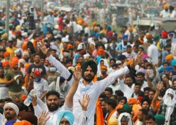 Farmers gesture as they block a national highway during a protest against farm bills passed by India's parliament, in Shambhu in the northern state of Punjab, India, September 25, 2020. Photo: Supplied/ REUTERS/Adnan Abidi
