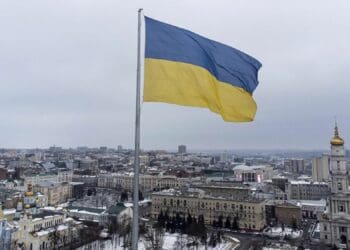 The yellow-blue Ukrainian flag hovers above the capital Kyiv as emergency meetings are being held across the world following the attack by Russia. Photo: Supplied/Food For Mzansi