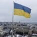 The yellow-blue Ukrainian flag hovers above the capital Kyiv as emergency meetings are being held across the world following the attack by Russia. Photo: Supplied/Food For Mzansi