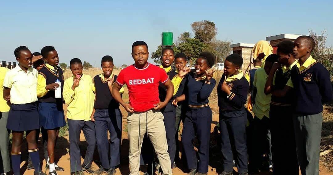 Isaac Khumalo and the pupils he mentors to venture into farming. Photo: Supplied/Food For Mzansi