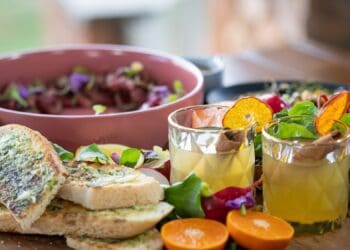 On this week’s episode of “Homegrown Tastes South Africa”, chef Lorna Maseko prepares a crusted carpaccio with honey vinaigrette, garlic and herb bruschetta and marinated olives. Photo: Supplied/Food For Mzansi