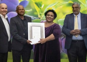 Hortgro chairman Nic Dicey, Ceres farmer Raymond Koopstad, national agri minister Thoko Didiza, and Deciduous Fruit Development Chamber chairperson Ismail Motala at the gala event. Photo: Supplied/Taariq Motala