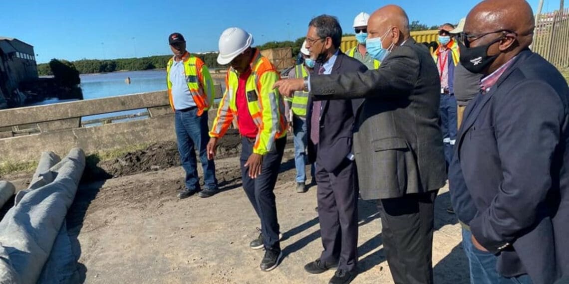 National minister Pravin Gordhan and Ebrahim Patel during their most recent visit to the Durban port to assess progress on repair work. Photo: Supplied/Transnet SOC Ltd