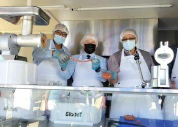 Dr Harry Malila, Head of Department and Accounting Officer for the Department of the Premier, Mayor Alderman Franken and minister of agriculture Ivan Meyer showing off freshly made sausage and patti. Photo: Supplied/Food For Mzansi