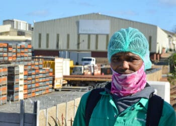 Langeberg & Ashton Foods buildings and yards line a significant stretch of Ashton’s main road. Jacobus de Koker isn’t permanently employed but says he has been working at the factory for years. Photo: Elana van der Watt/Food For Mzansi