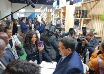 Founder of Kaukou Honeybush Tea, Theo Adams engaging with President Cyril Ramaphosa at the Black Industrialists and Exporters Conference 2022 at the Sandton Convention Centre. Photo: Supplied/Theo Adams