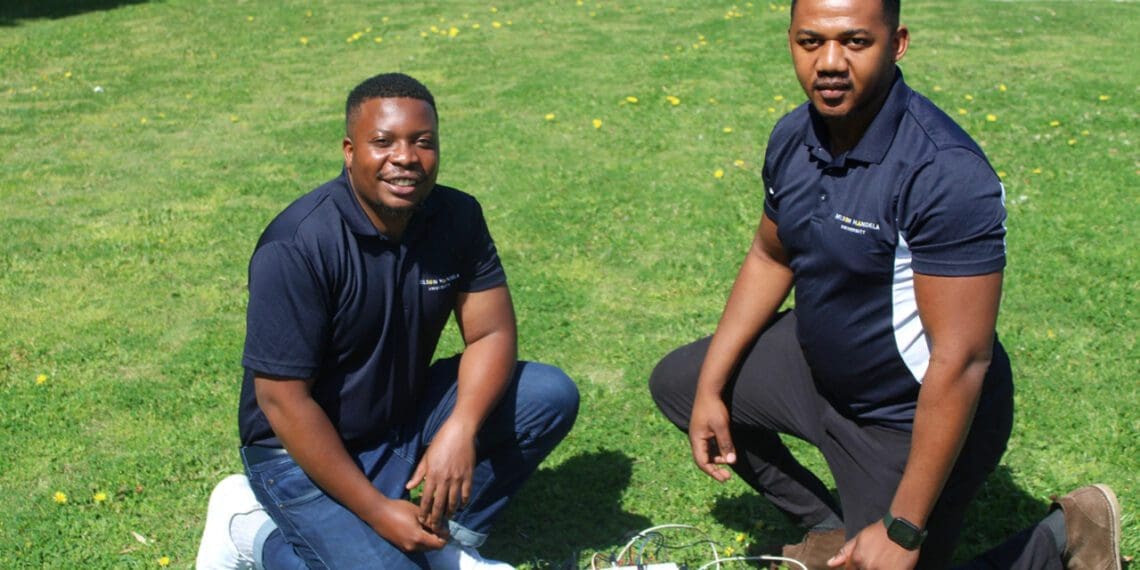 Cleo Watama and Tinashe Chizema with their sensor box that they are developing to help small-scale farmers address climate change challenges. Photo: Estelle Ellis