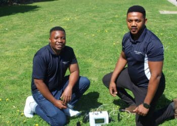 Cleo Watama and Tinashe Chizema with their sensor box that they are developing to help small-scale farmers address climate change challenges. Photo: Estelle Ellis