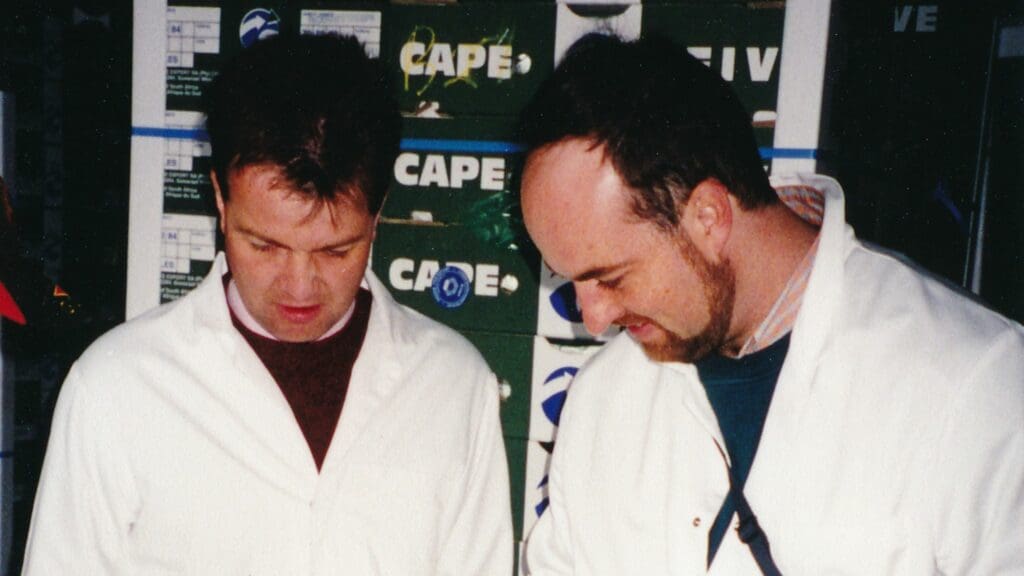 Mike Jobbins and Wayne Mudge inspecting pears for export in the early days. Photo: Photo: Supplied/Cape Five