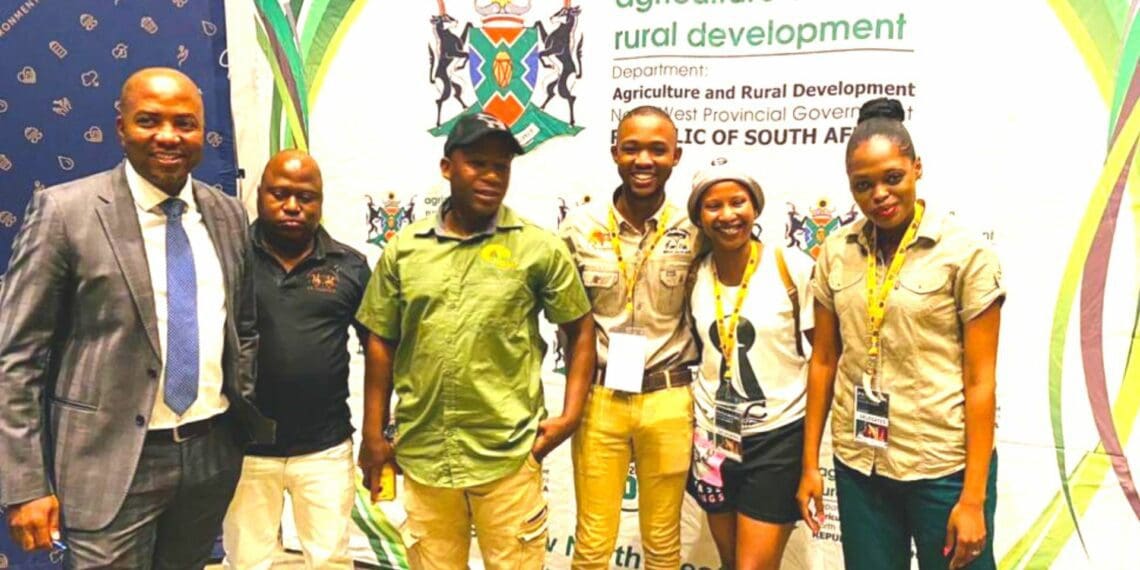 Young farmers in the North West with members of the agricultural department at the first provincial agricultural market access summit. Photo: Supplied/ Thabo Dithakgwe