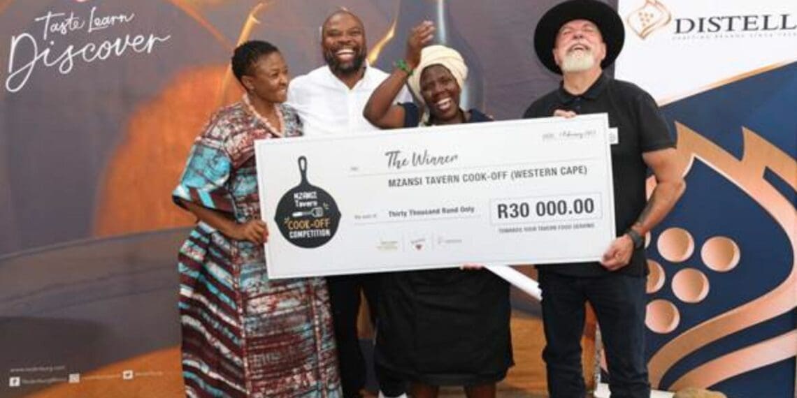 From left: Chairperson of the Drinks Federation of South Africa Monhla Hlahla, chef Bennie Masekwameng, winner Grace Telana, and chef Peter Goffe-Wood celebrate after the Mzansi Tavern Chef Cook-off at Nederburg Wine Estate in Paarl. Photo: Supplied/Food For Mzansi