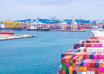 South African shipping containers at a busy harbour reflect the country’s exports to the U.S., as the Agoa extension provides a temporary lifeline for trade and exporters. Photo: CGA