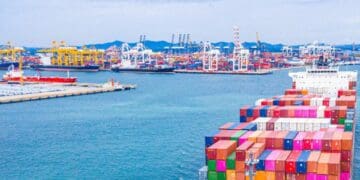 South African shipping containers at a busy harbour reflect the country’s exports to the U.S., as the Agoa extension provides a temporary lifeline for trade and exporters. Photo: CGA