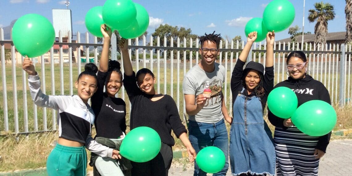 Cheers to the future of agriculture. Food For Mzansi, assistant editor, Duncan Masiwa, celebrating our fifth birthday with young Food For Mzansi readers. Photo: Calvyn Grandling