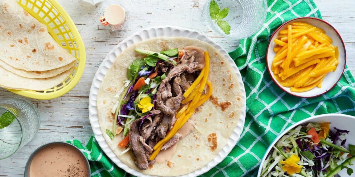 Tuck into this lip-smacking lamb wrap with grilled mango