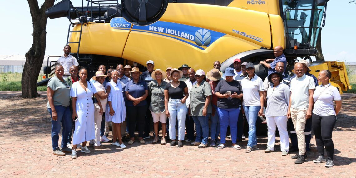 MEC Desbo Mohono with beneficiaries in Madibeng with their equipment donated by the North West government. Photo: NW DARD
