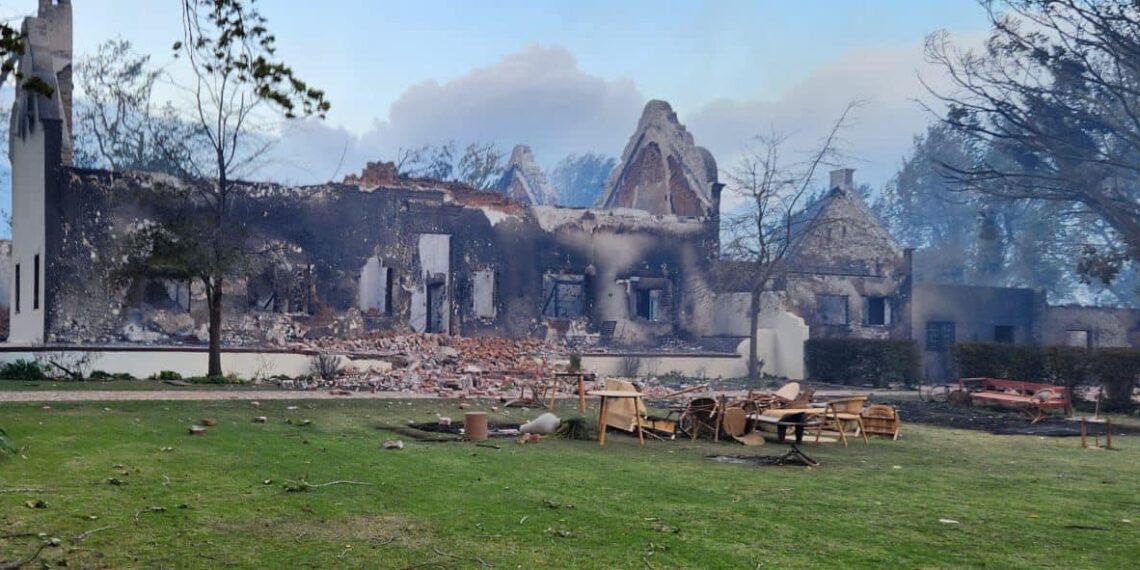 The iconic 300-year-old Blaauwklippen Manor House and Jonkershuis burnt during fires caused by extreme weather conditions in the Western Cape. Photo: Facebook