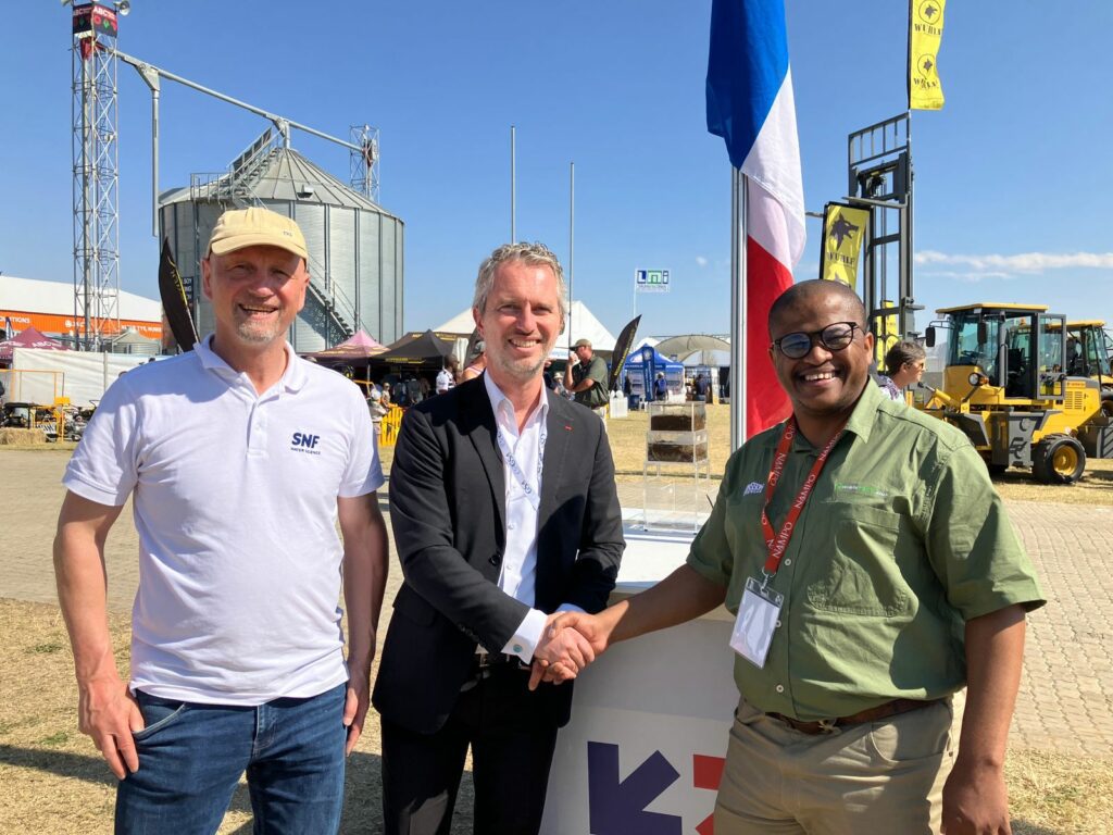 A representative of SNF alongside French ambassador, David Martinon (centre), and Food For Mzansi news editor, Tiisetso Manoko, at Nampo Harvest Day. Photo: Adéle Changuion/Food For Mzansi