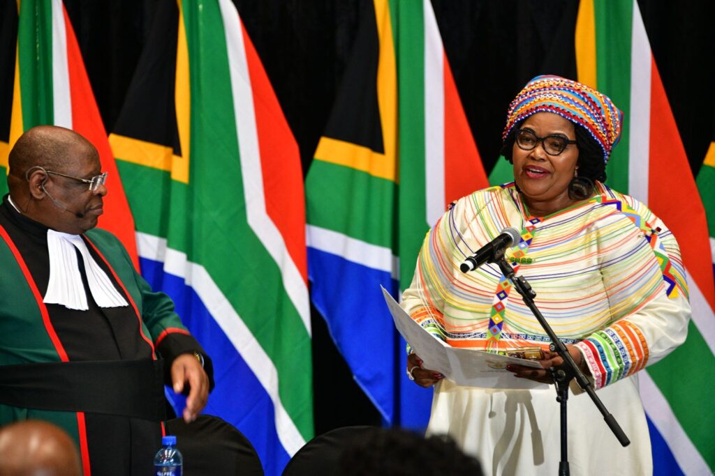 Water and sanitation minister Pemmy Majodina (right). Photo: Supplied/GCIS