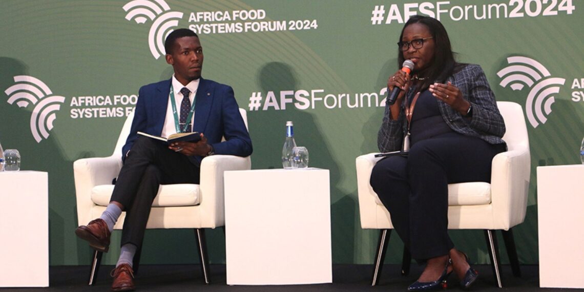 Listening to farmers like Samuel Nsengiyumva (left) is key to understanding their needs within the regenerative agricultural system says Mildred Nadah Pita, Bayer head of public affairs and sustainability in Africa. Photo: Supplied/Food For Mzansi