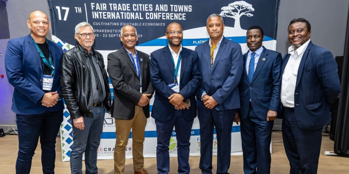 Executive mayor of Drakenstein Municipality, Stephen Korabie; Western Cape minister of cultural affairs and sport Ricardo Mackenzie; Isaac Tongola, executive director of Fairtrade Africa, along with other Drakenstein executives at the opening of the 17th Fair Trade Cities and Towns Conference. Photo: Natalie Gabriels/Food For Mzansi