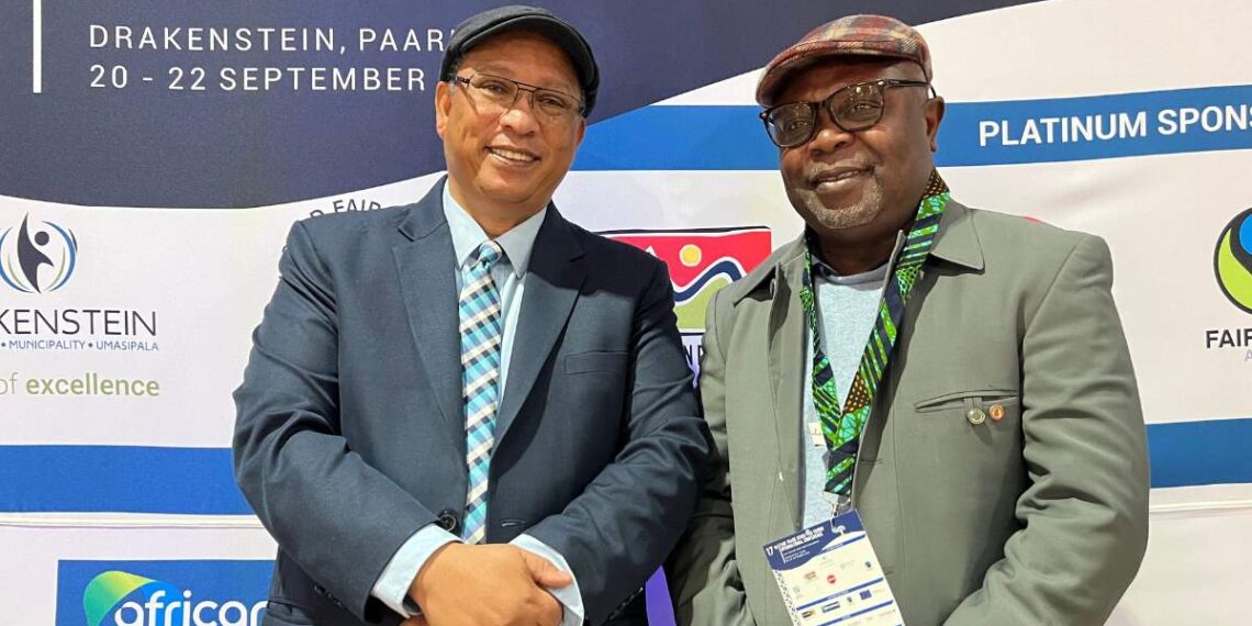 Dr Ivan Meyer, Western Cape minister of agriculture, economic development and tourism, alongside Dr Daniel Edjo’o, Ebolowa city mayor in Cameroon, at the 17th Fair Trade Cities and Towns International Conference in Paarl, South Africa. Photo: Ivor Price/Food For Mzansi