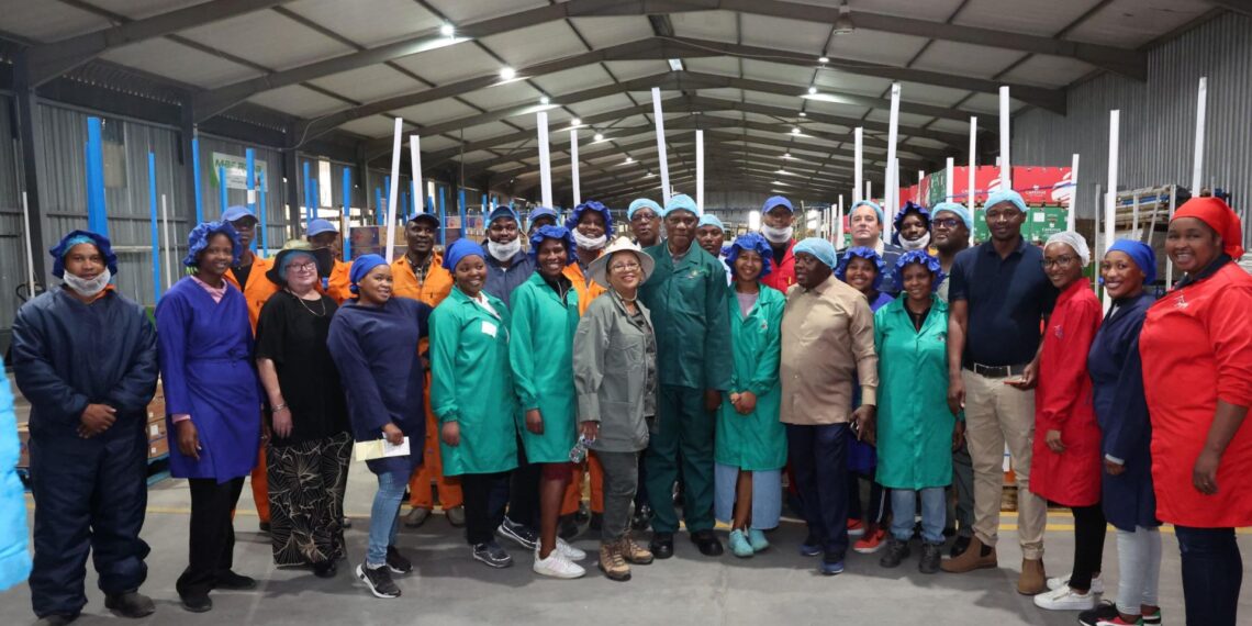Deputy president Paul Mashatile with a group of workers during his visit to the Remmoho Investment in Agriculture pack-. house in Bethlehem. Photo: Supplied/Food For Mzansi