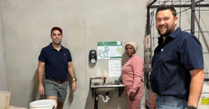 Franco Marais, BASF regional sales manager (left), and Innes Joubert, BASF key account manager, at a farm store where a soap dispenser was installed as part of BASF’s ongoing safety and stewardship campaign. Photo: Supplied/Food For Mzansi