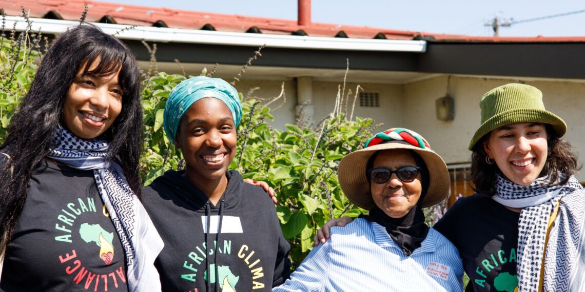 From left to right: Samantha Muller, Mitchelle Mhaka, Washiela Isaacs, and Stella Hertantyo at Cape Town Climate Week, visiting the Oppieyaart in Elsies River.
Photo: The Dollie House