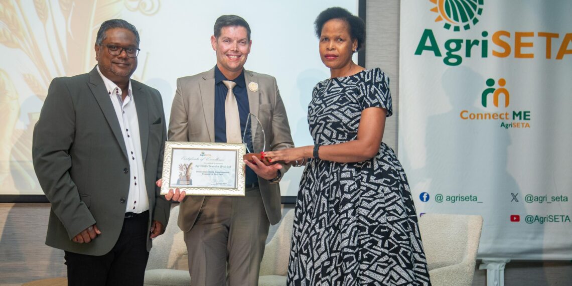 AgriSETA’s Anban Govender (left) and Johannah Masombuka (right) celebrate with Shaun Welmans, CEO of Agri Skills Transfer, whose company won Innovative Skills Development Project of the Year at AgriSETA’s Stakeholder Excellence Awards 2025. Photo: Supplied/Food For Mzansi