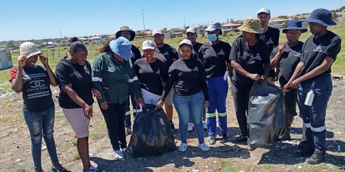 Youth from Standerton’s NYS and aRe Bapaleng programmes celebrate after clearing dumping sites, building parks, and tending community gardens. Photo: Seriti Institute