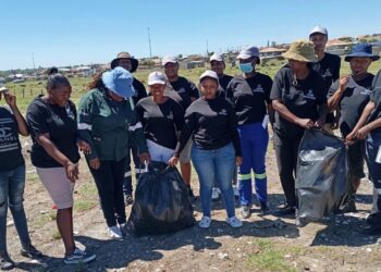 Youth from Standerton’s NYS and aRe Bapaleng programmes celebrate after clearing dumping sites, building parks, and tending community gardens. Photo: Seriti Institute