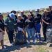 Youth from Standerton’s NYS and aRe Bapaleng programmes celebrate after clearing dumping sites, building parks, and tending community gardens. Photo: Seriti Institute